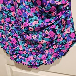 One piece tummy control, side ruched design, ruffled skirt